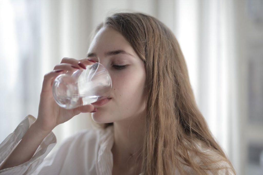 Glass of water supporting healthy digestion and hydration habits